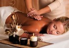 professional masseur doing massage of female back